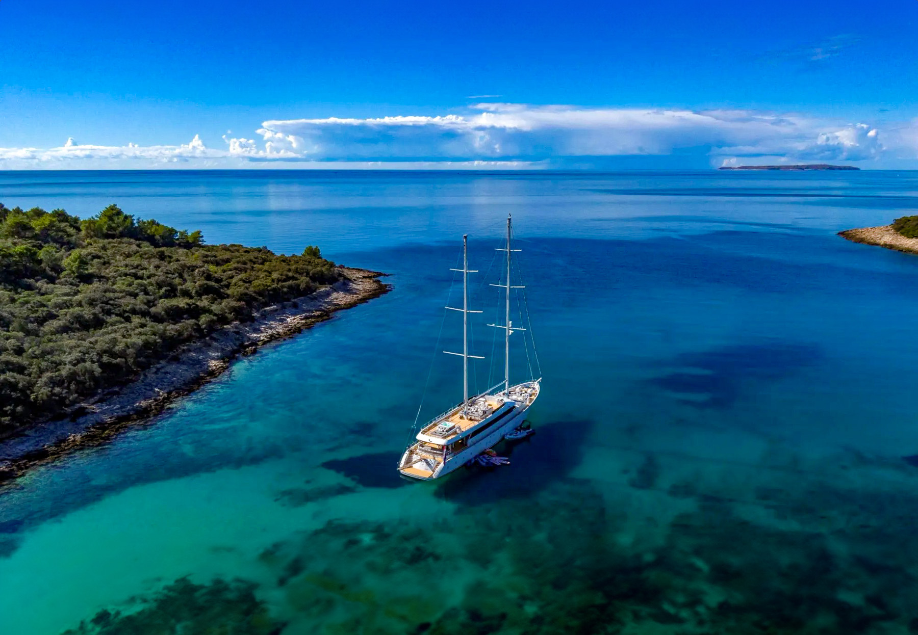 Aerial view of the Aurum Sky luxury yacht moored in a bay in Croatia