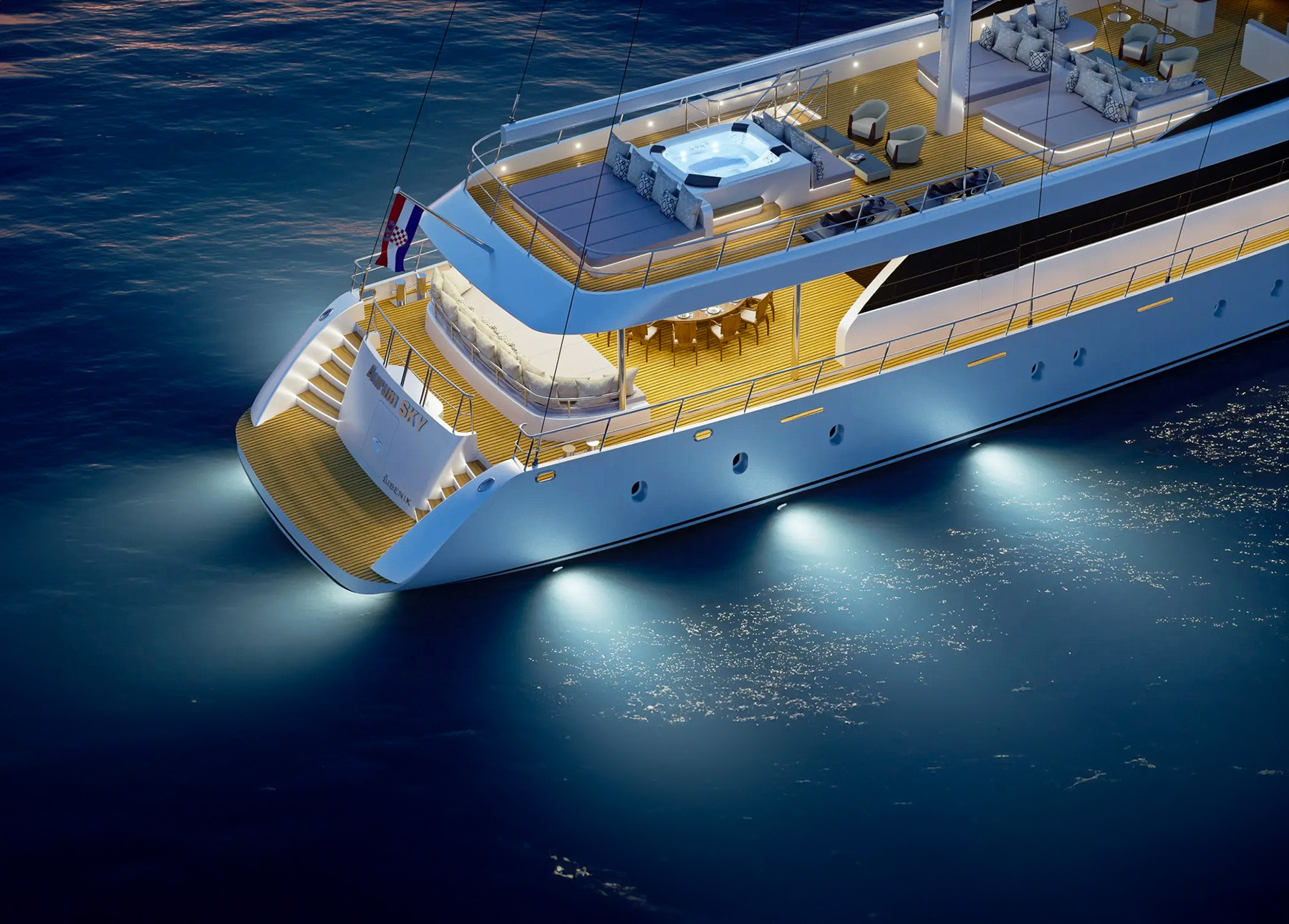 Aerial view of Aurum Sky's aft deck lit up at night in Croatia