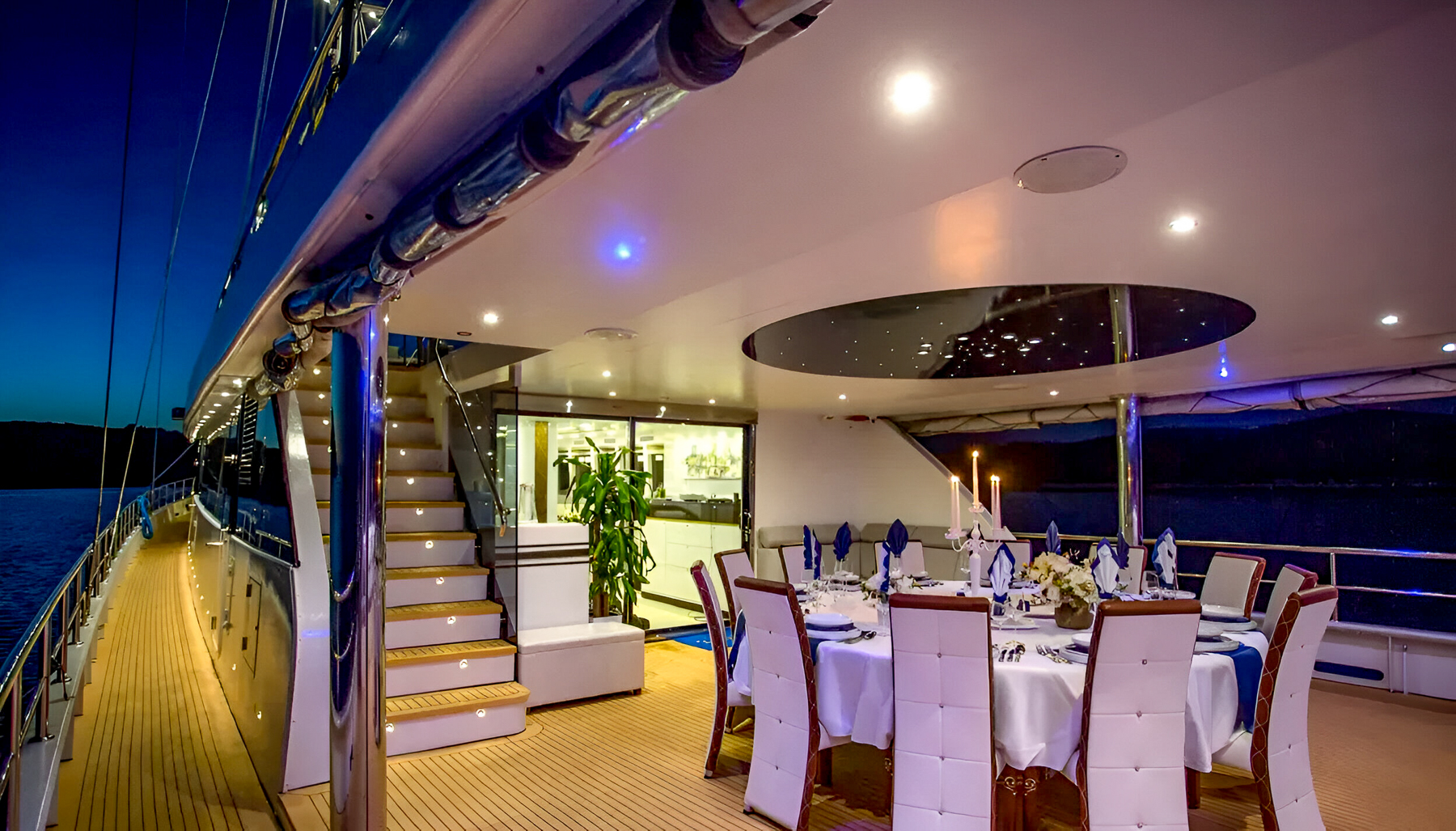 Deck with dining table onboard the Aurum Sky luxury yacht in Croatia