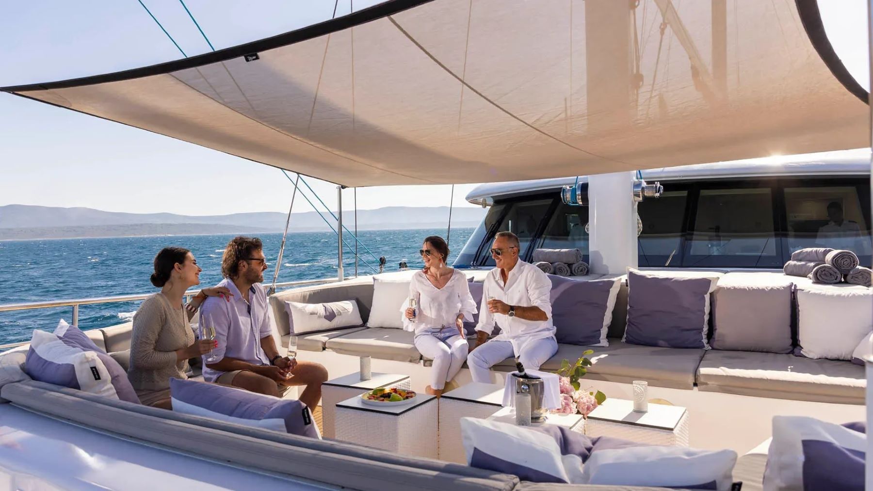 Guests socialising on the deck of Aurum Sky in Croatia