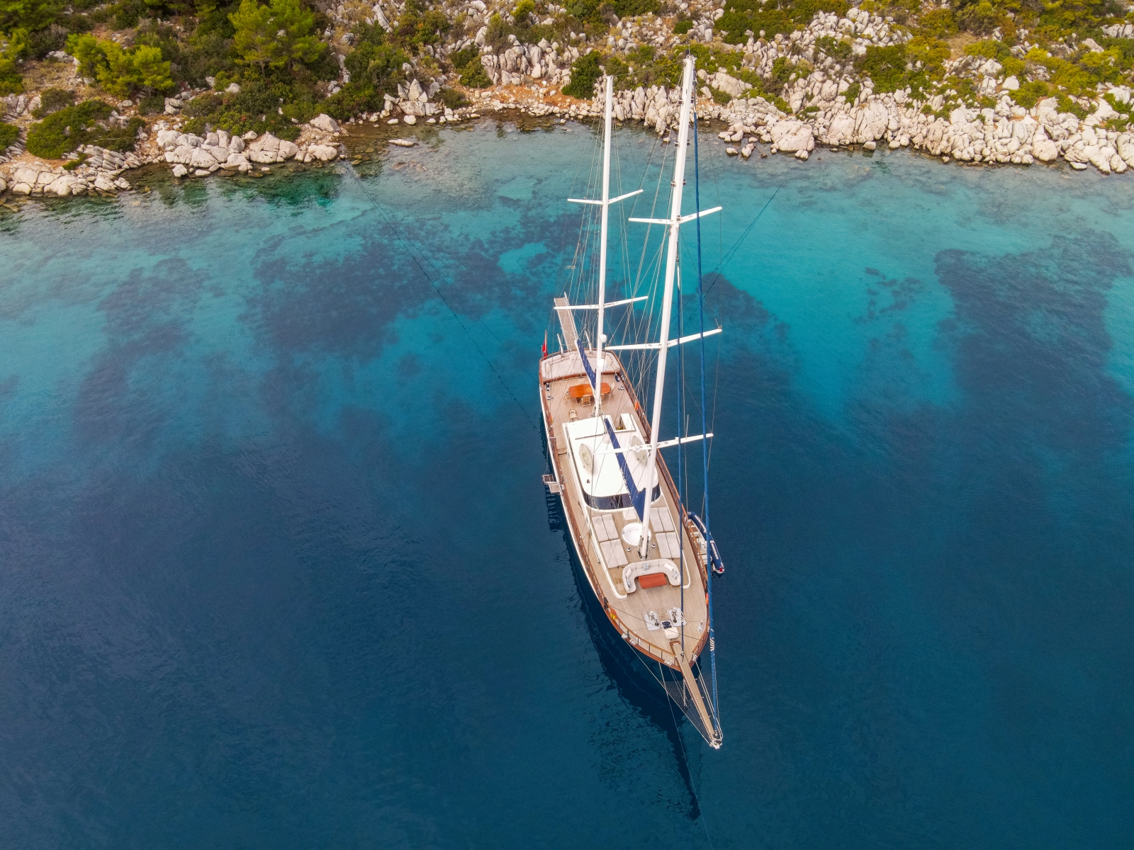 Aerial shot of luxury gulet Blue Heaven anchored off the Turkish coast