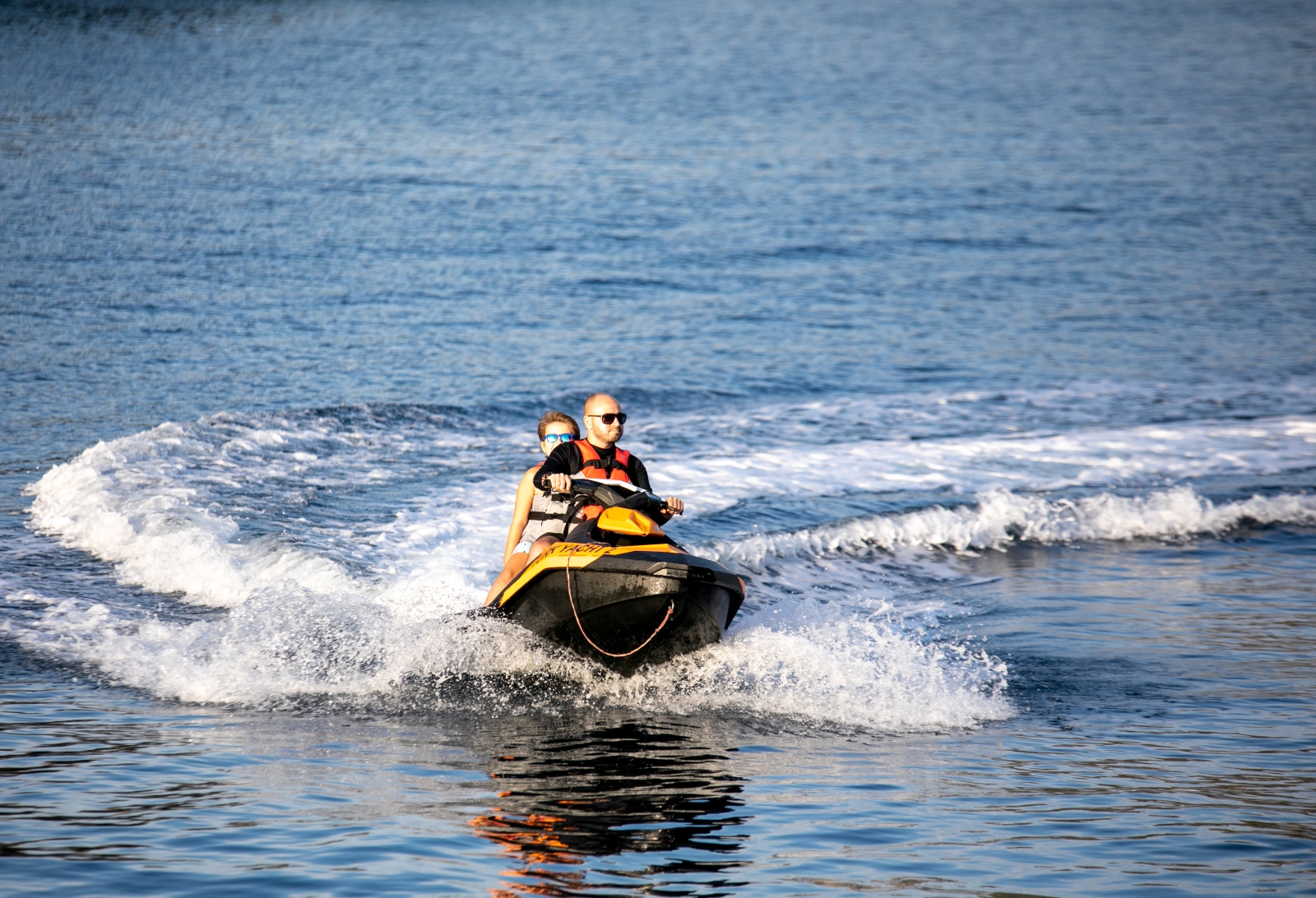 Guests enjoying a jetski ride during a cruise with luxury gulet Blue Heaven