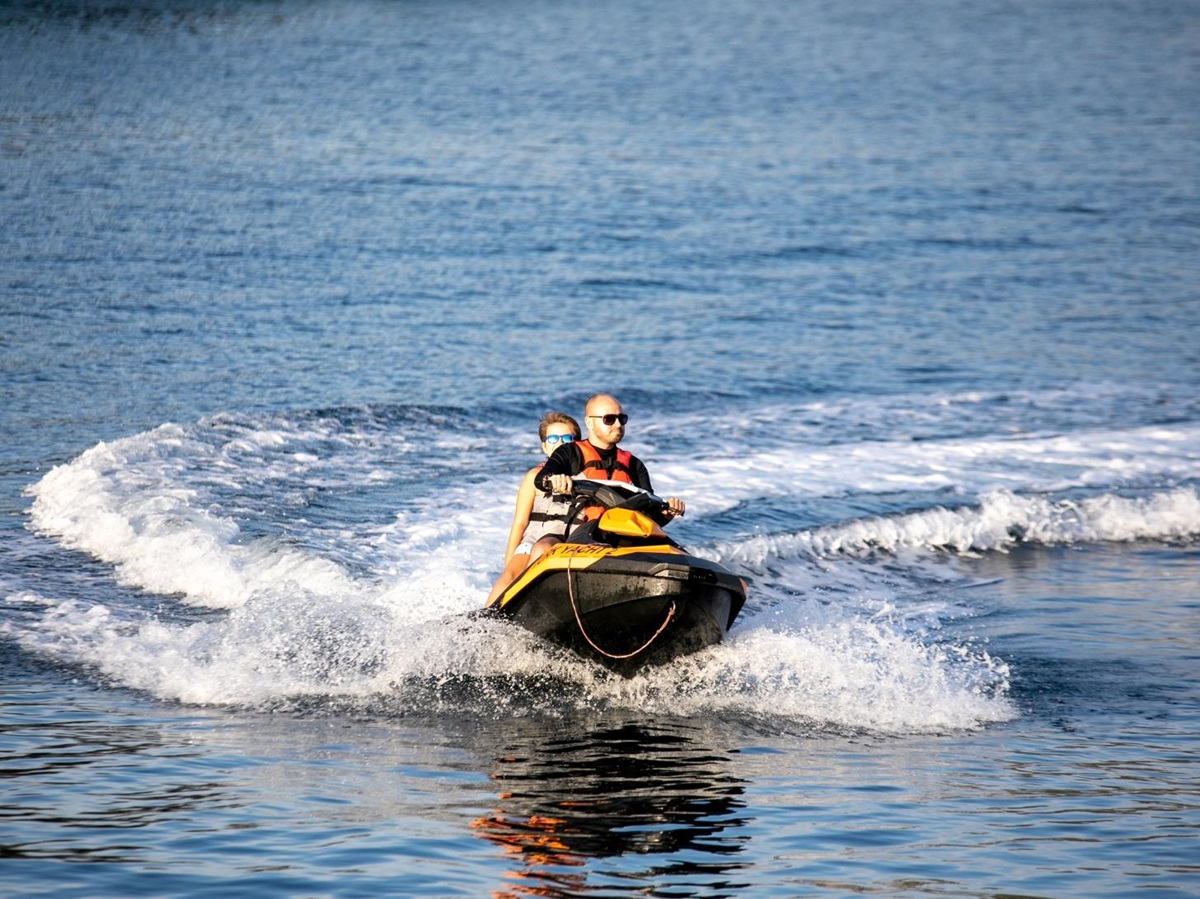 Guests enjoying a jetski ride during a cruise with luxury gulet Blue Heaven