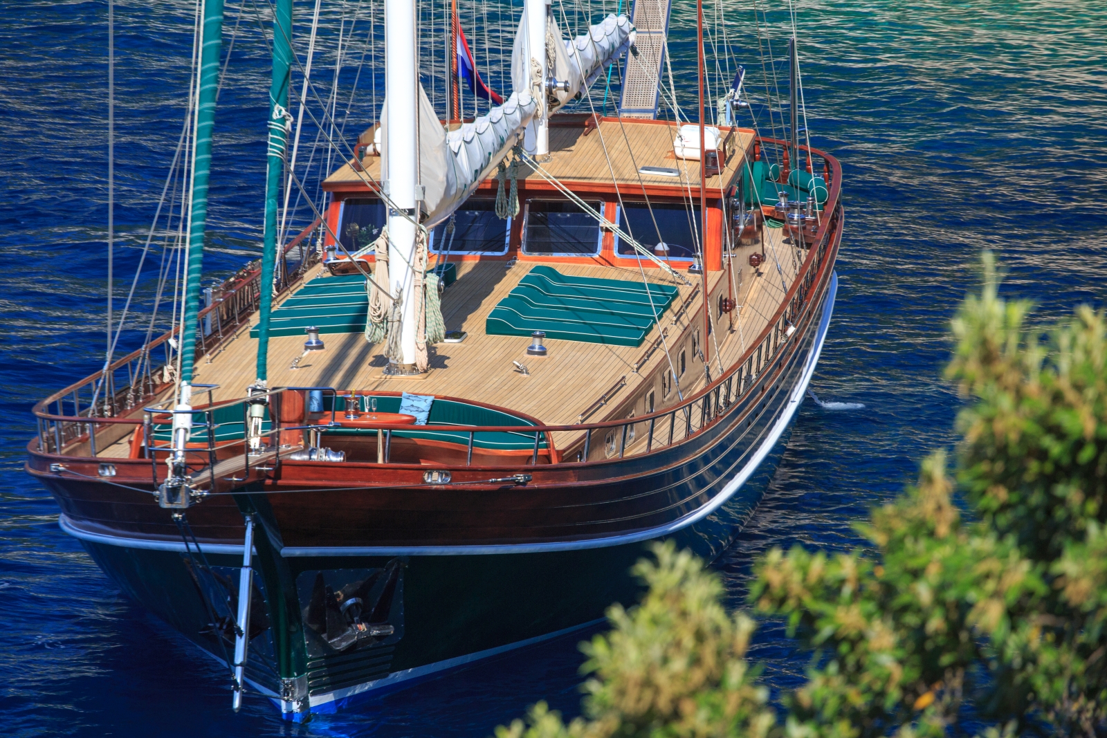Exterior view of the luxury gulet Carpe Diem 7, showing deck with lougers and seating 