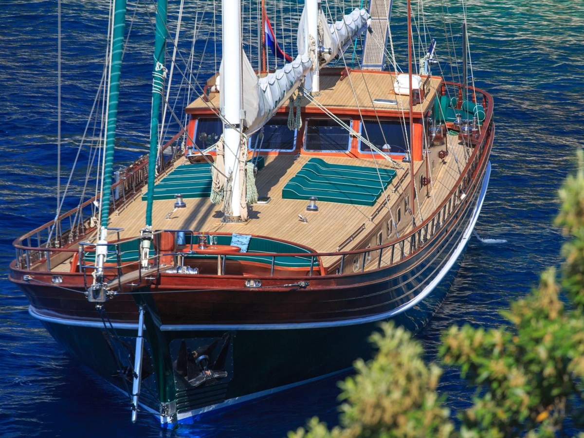 Exterior view of the luxury gulet Carpe Diem 7, showing deck with lougers and seating