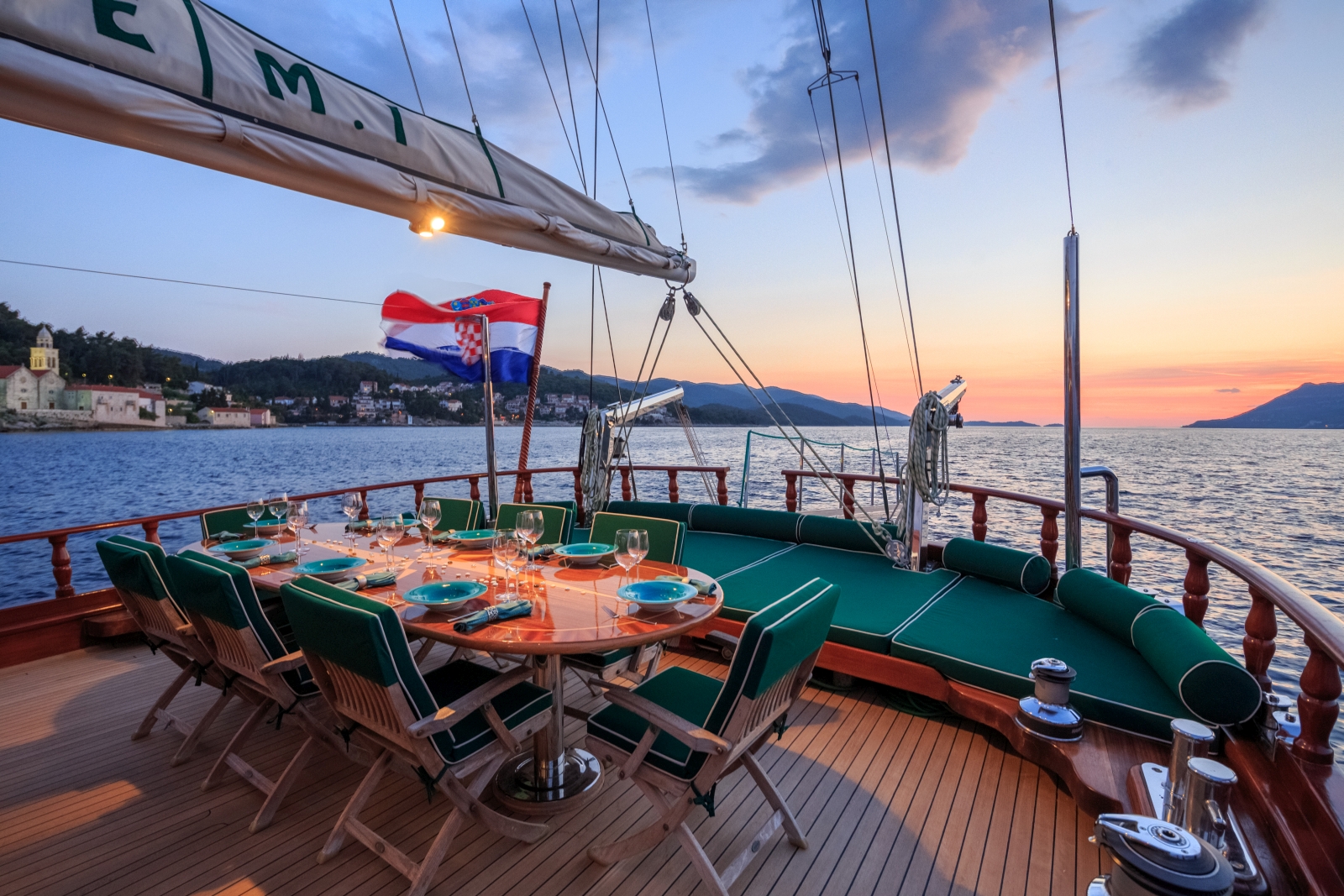 Enjoying the sunset while dining on the deck of the luxury gulet Carpe Diem 7