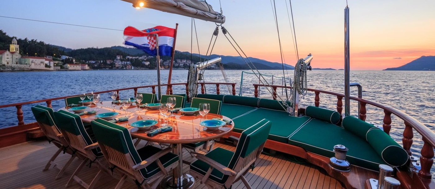 Enjoying the sunset while dining on the deck of the luxury gulet Carpe Diem 7