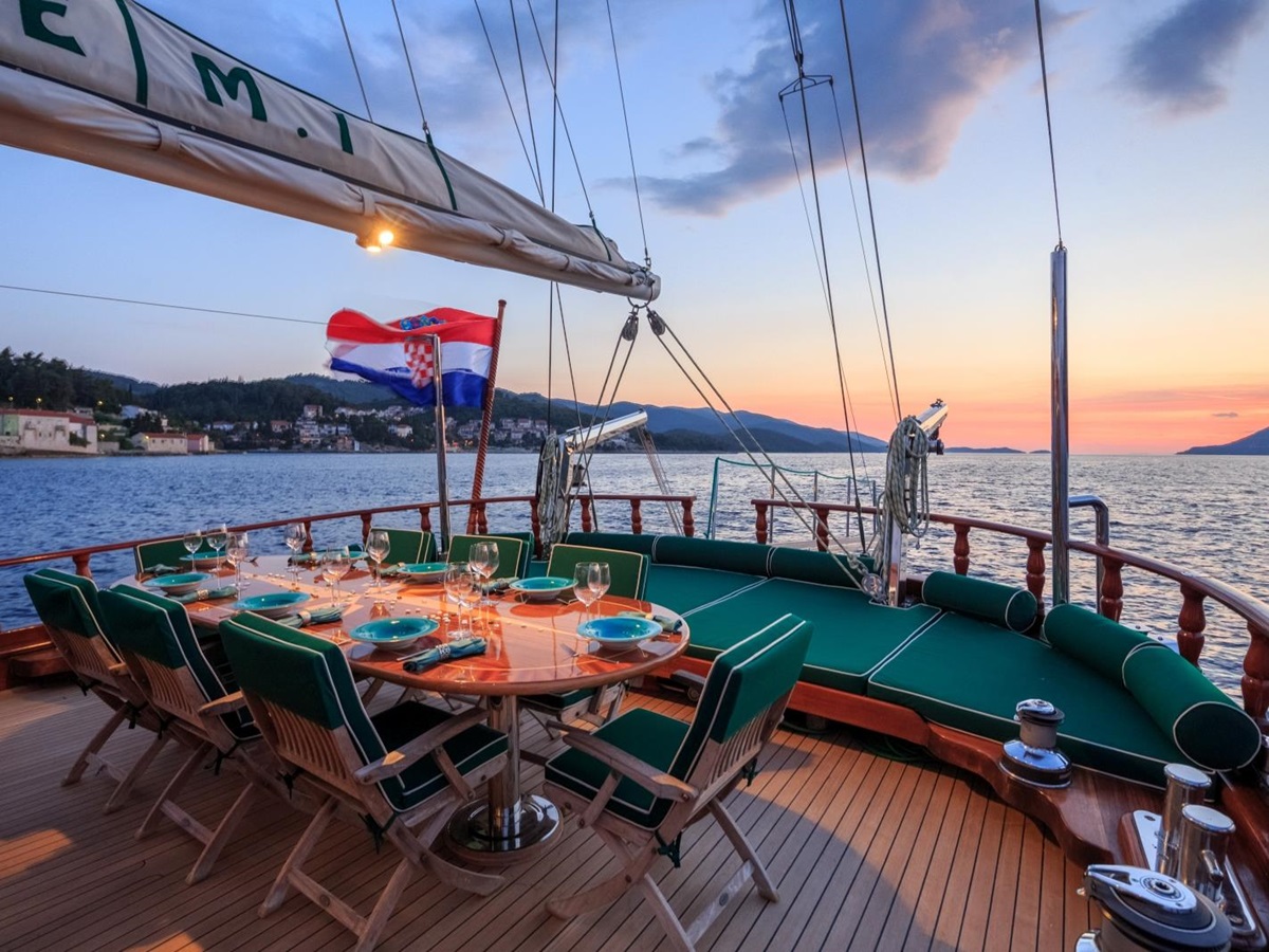 Enjoying the sunset while dining on the deck of the luxury gulet Carpe Diem 7