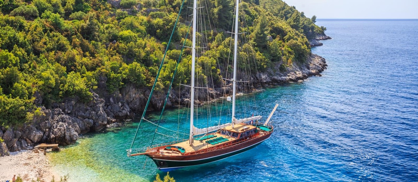 the luxury gulet Carpe Diem 7 in a bay of the turquoise Mediterranean Sea