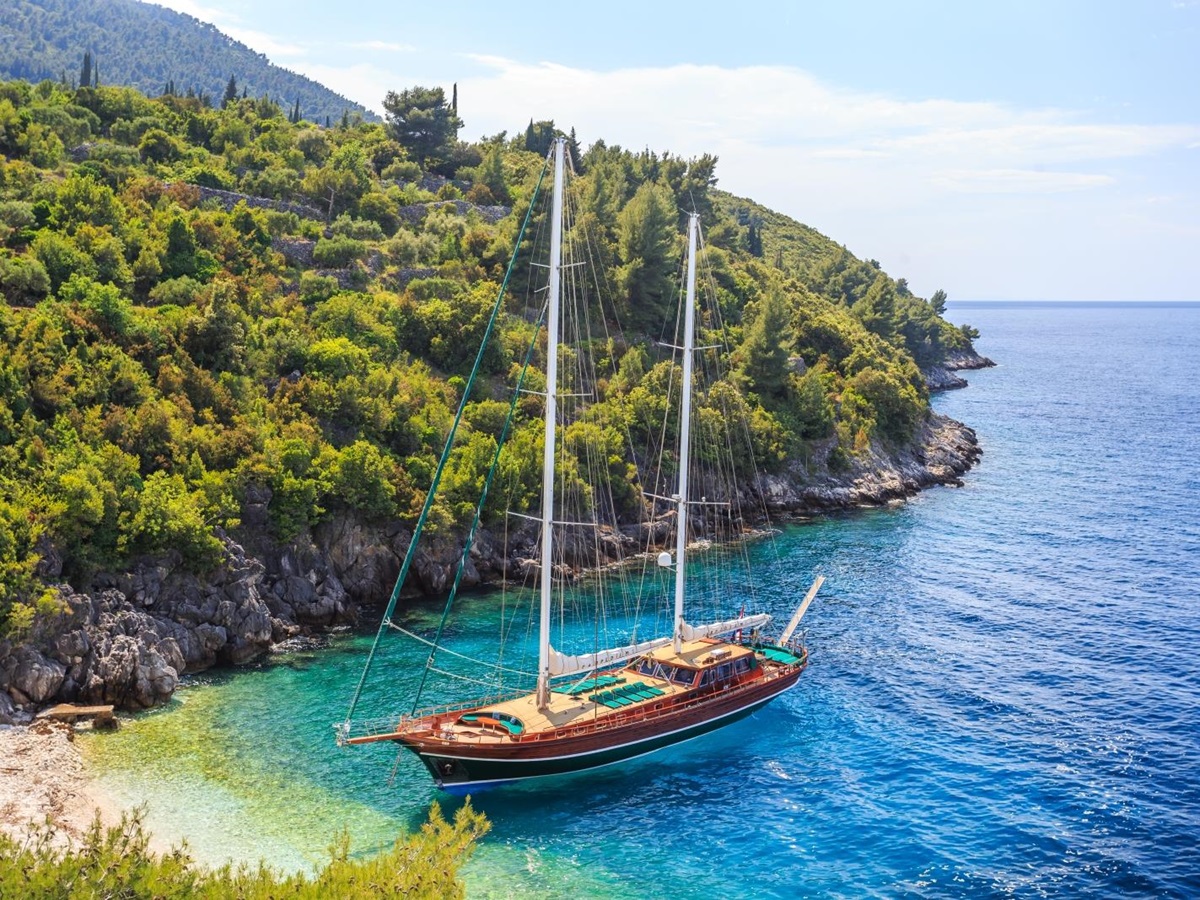 the luxury gulet Carpe Diem 7 in a bay of the turquoise Mediterranean Sea