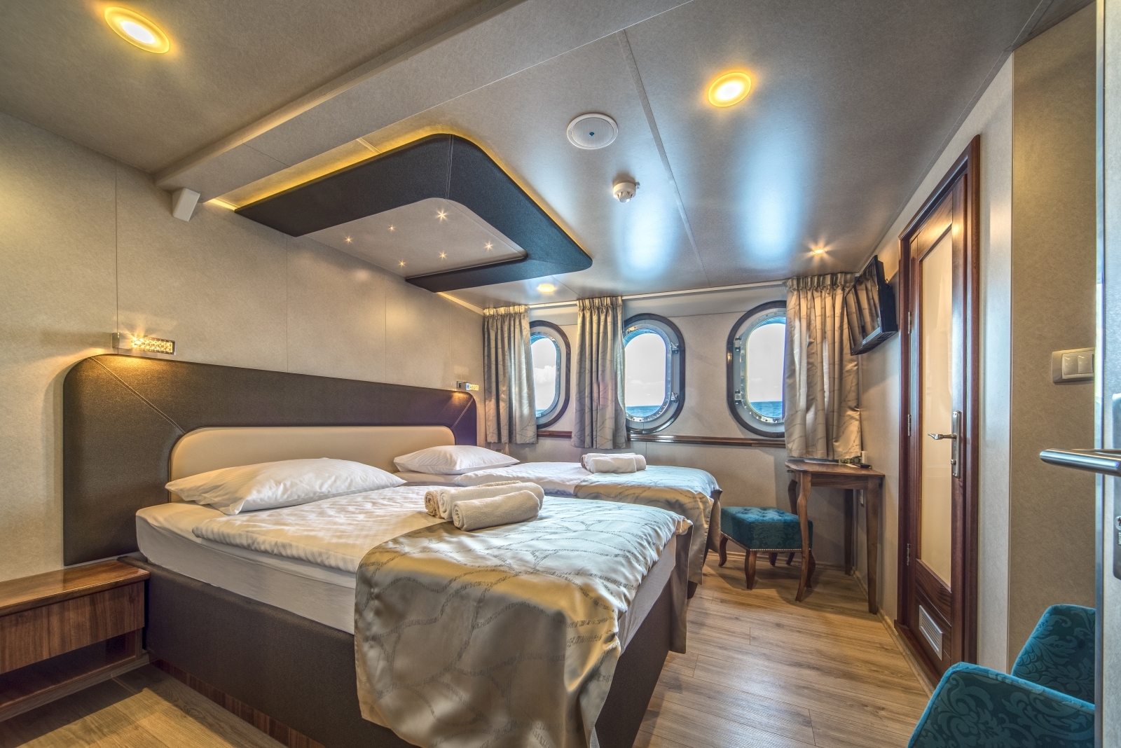 Spacious master cabin onboard the luxury gulet Casablanca with windows and storage