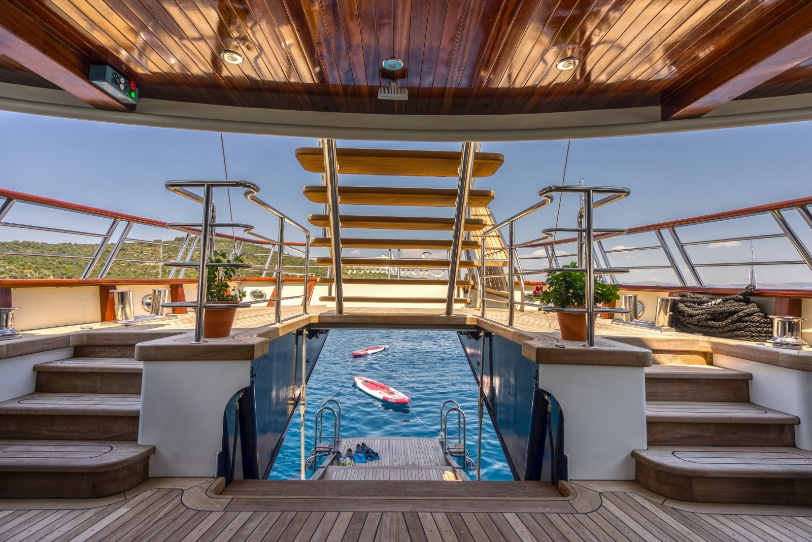 Staricases onboard the luxury gulet Casablanca leading from the activity deck on water-level to the sundeck