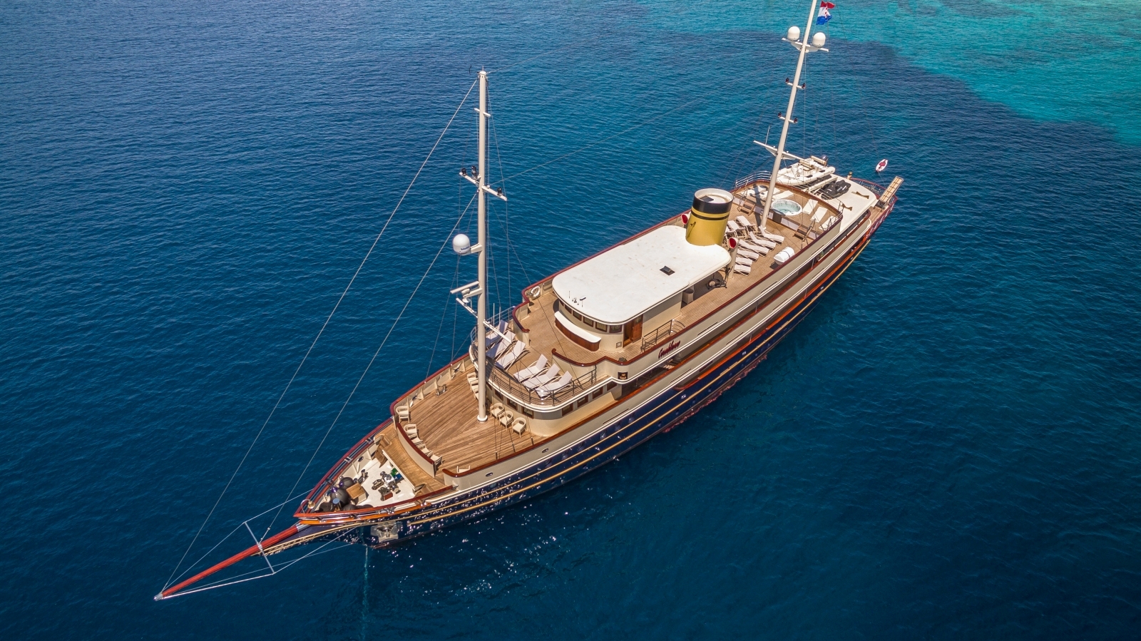 Aerial shot of luxury gulet Casablanca cruising in the turquoise waters of the Mediterranean Sea