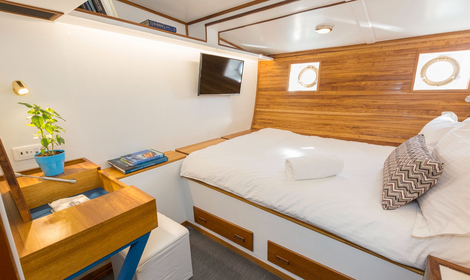 Guest cabin onboard the Cosmos luxury yacht in Greece