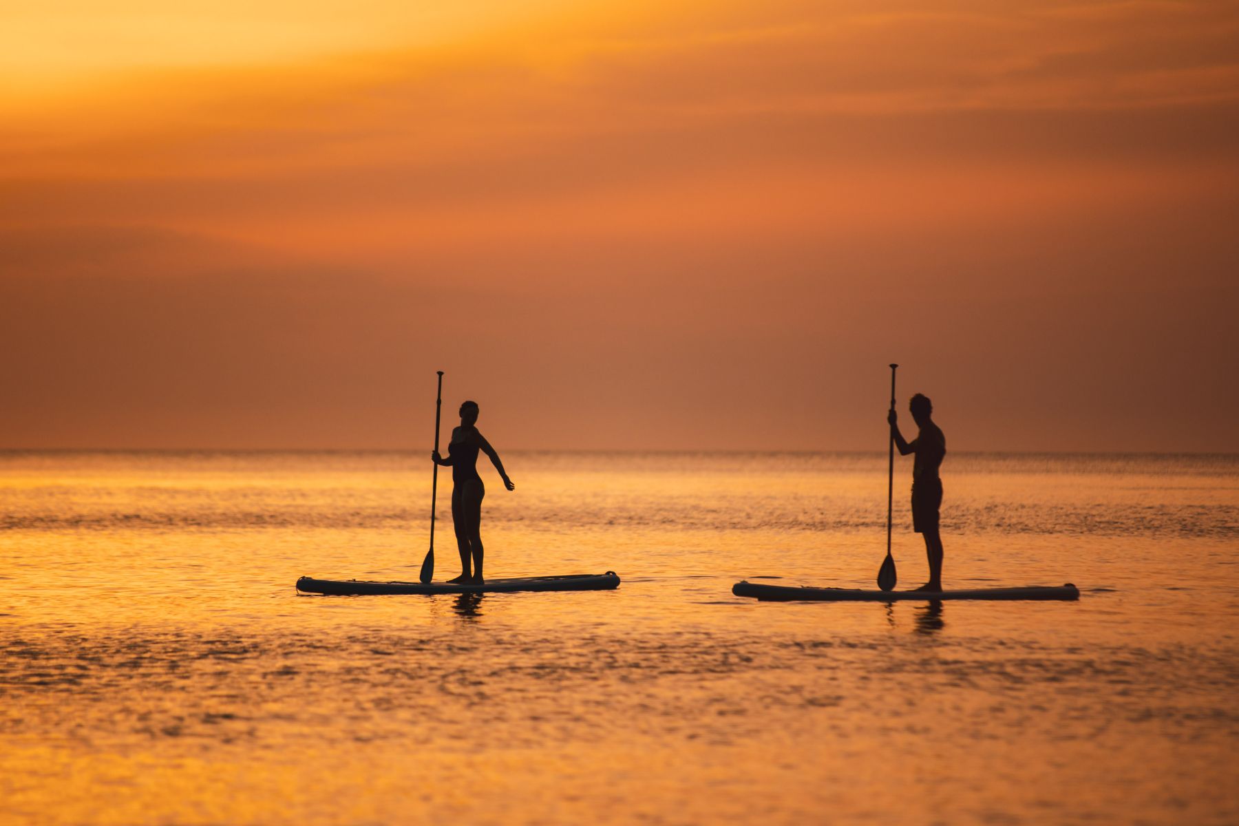 Paddleboarding during sunset at Six Senses Ibiza