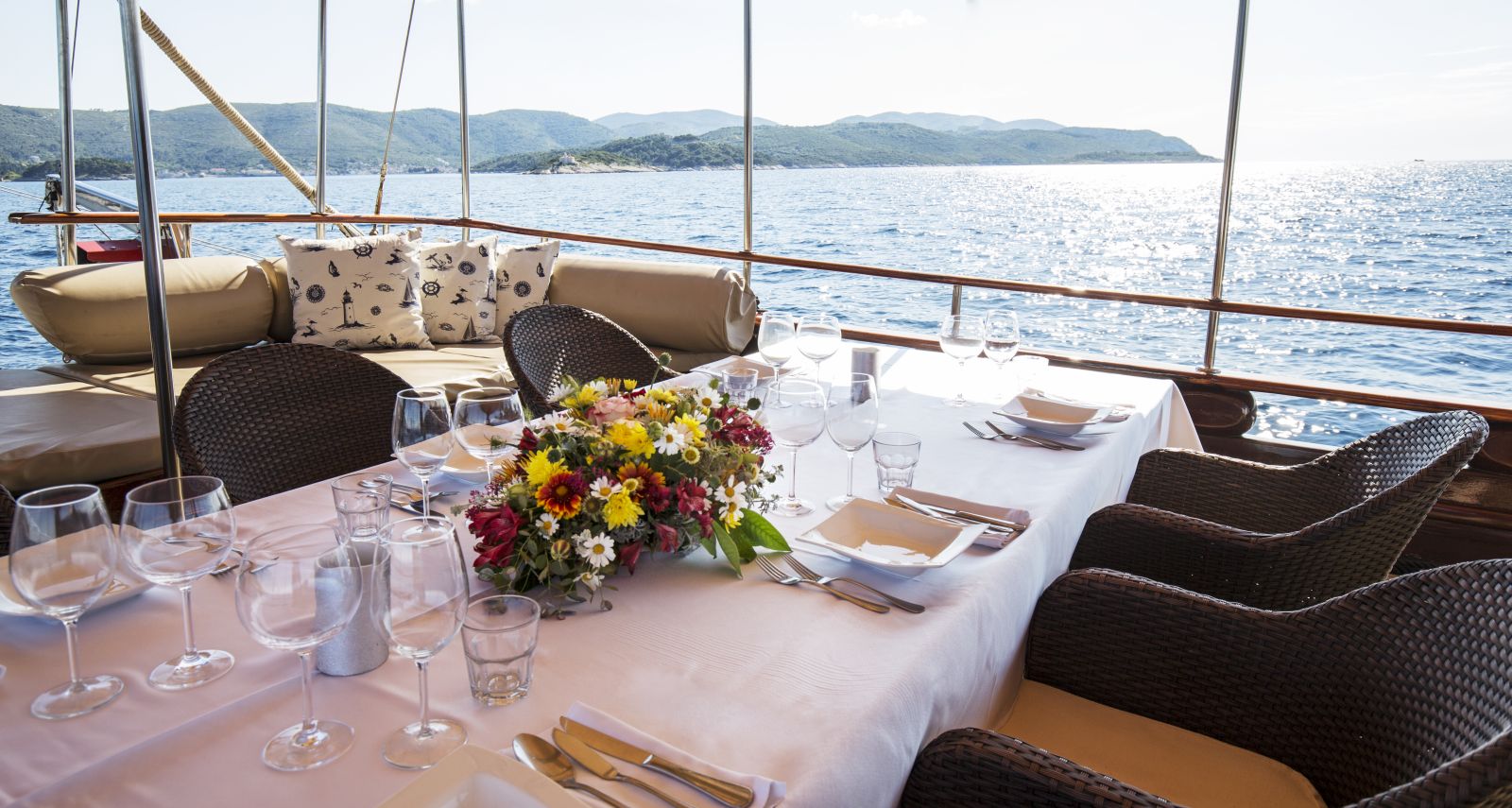 Outsdoor dining area on board Eleganza