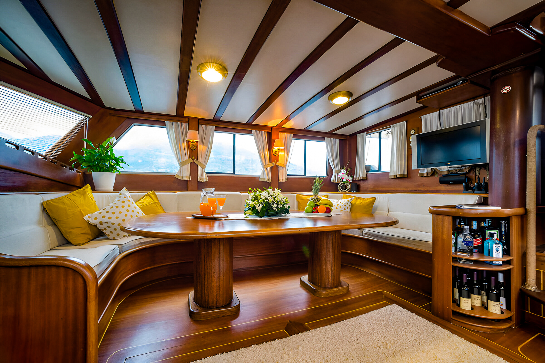 Indoor dining area onboard the Kaptan Sevket luxury gulet in Montenegro
