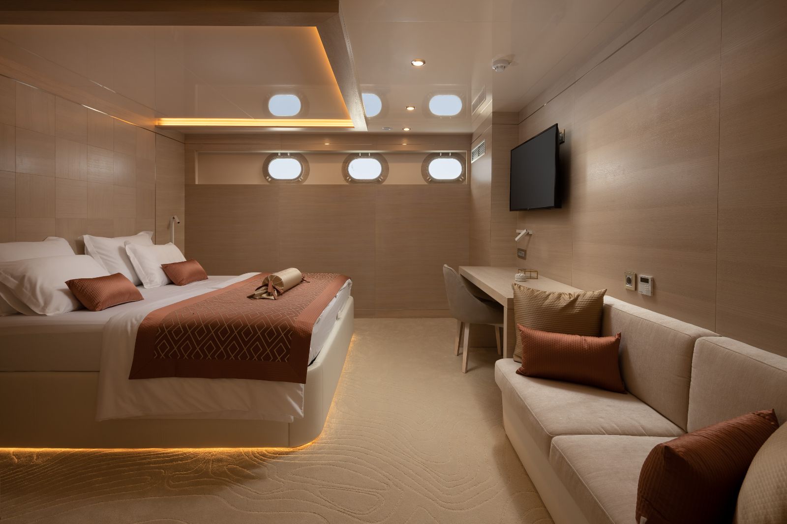 Guest cabin bed and seating onboard the Love Story gulet in Croatia