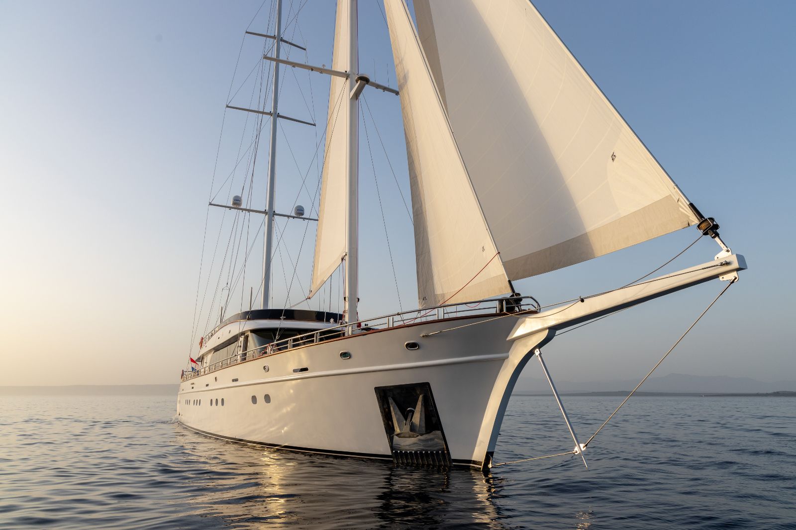 Exterior view of the Love Story gulet with its sails up at sea in Croatia