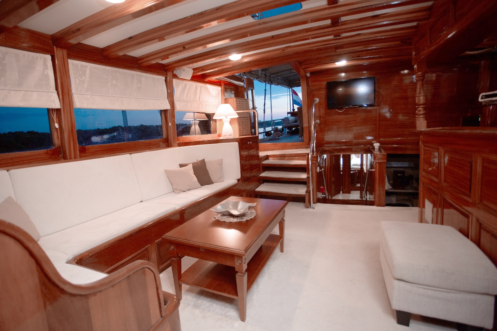Salon of luxury gulet Malena with slat screen tv and bar