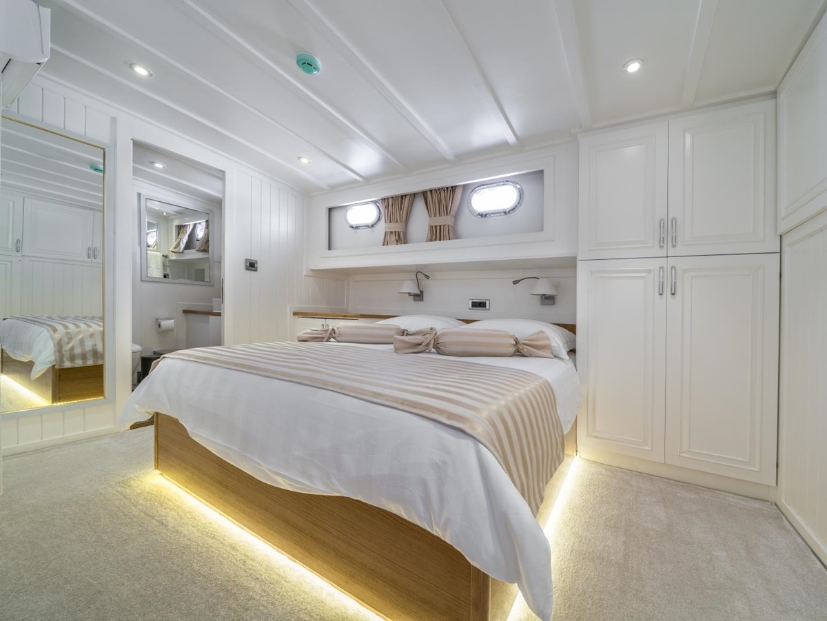 Master cabin with spacious storage onboard the luxury gulet Maske