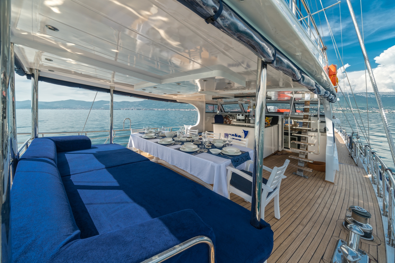 Deck dining onboard the luxury gulet Maske