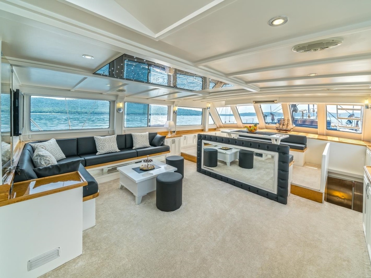 Modern salon of the luxury gulet Maske with panoramic windows and flatscreen tv