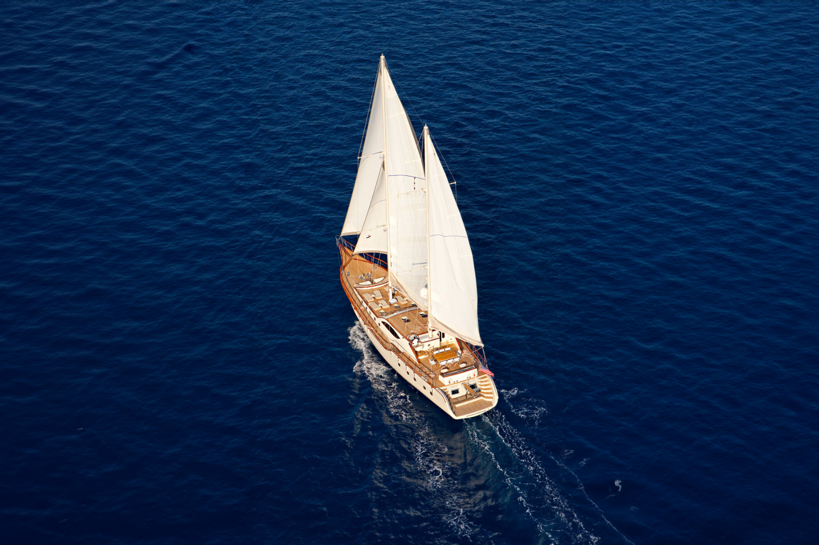 Aerial view of Miss B with sails up in Turkey