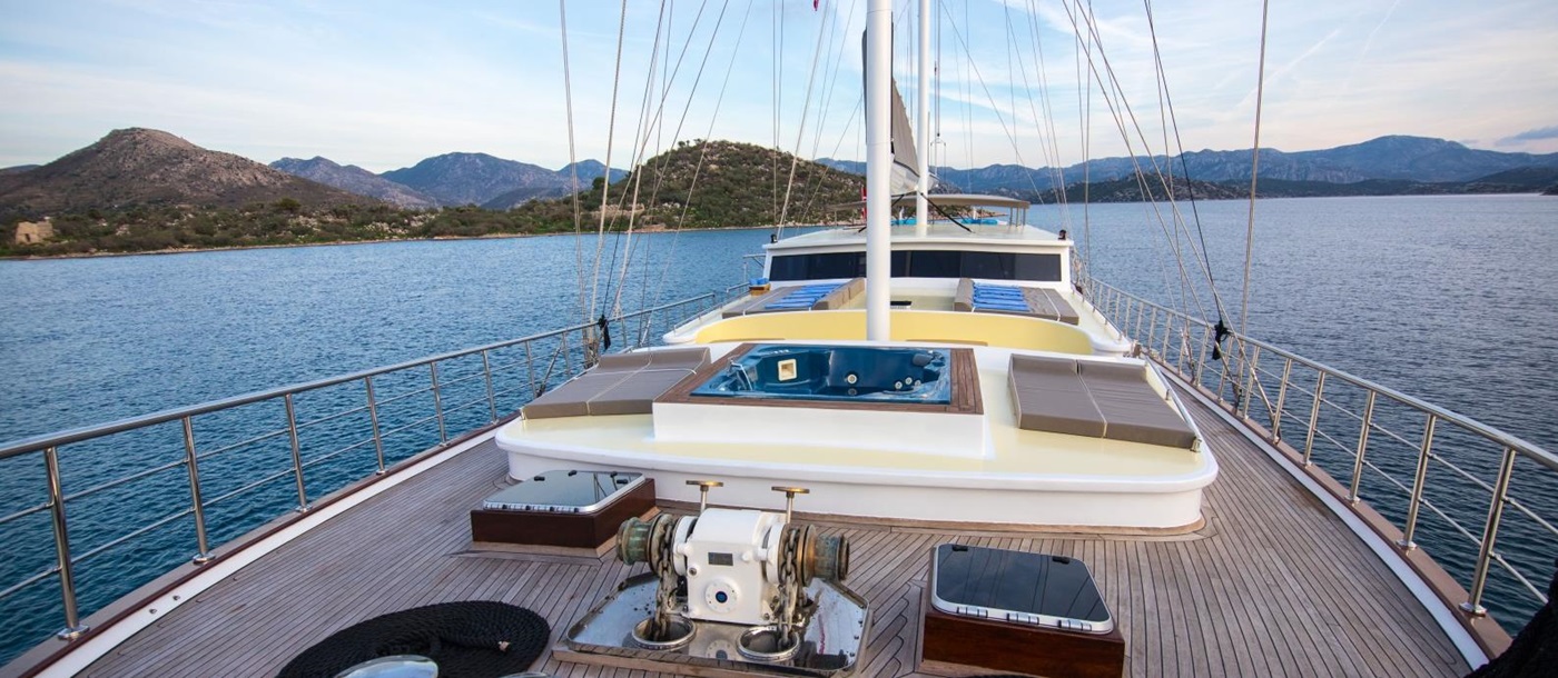 Deck of luxury gulet Nevra Queen with sunloungers and jacuzzi