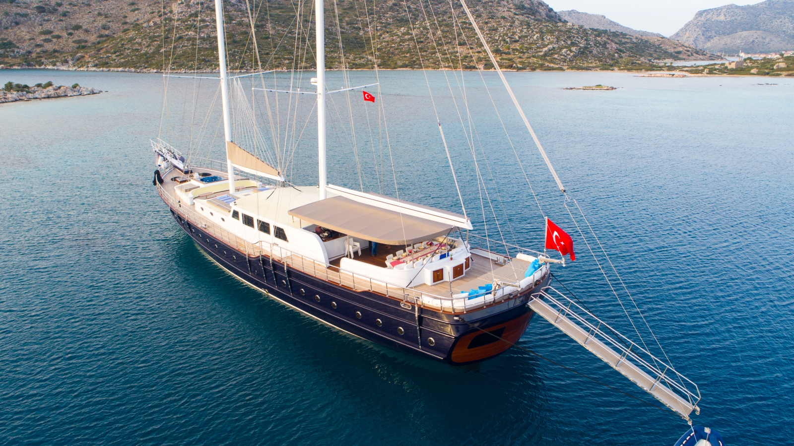 View of the luxury gulet Nevra Queen anchored in the turquoise waters of the Mediterranean Sea