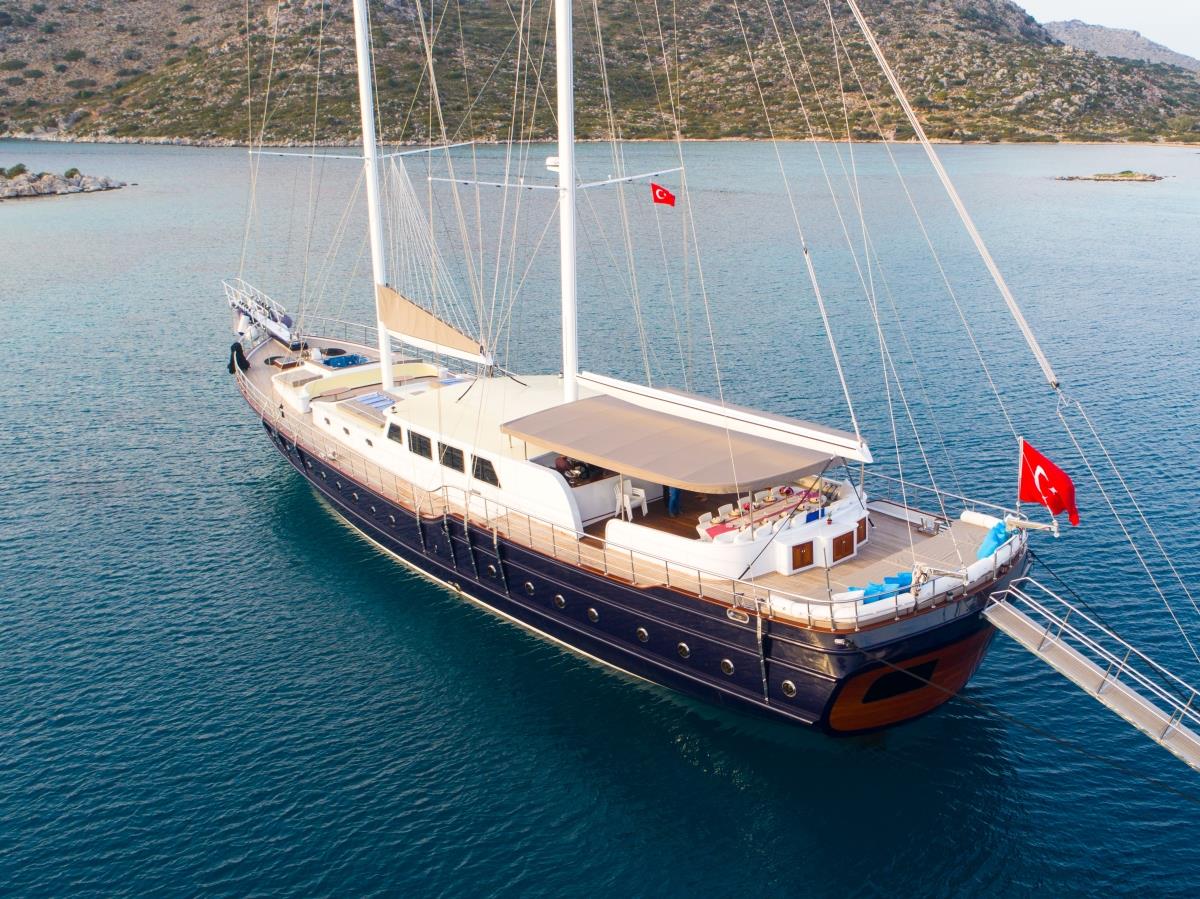 View of the luxury gulet Nevra Queen anchored in the turquoise waters of the Mediterranean Sea