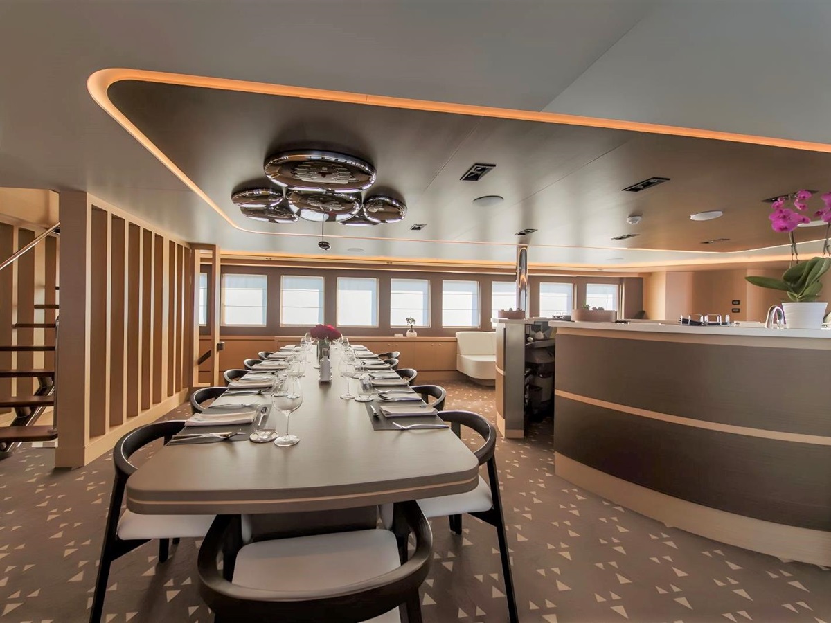 Indoor dining table onboard the Omnia gulet in Croatia