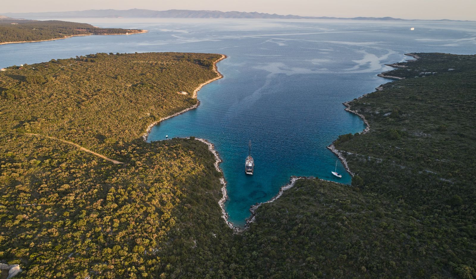 Aerial view of Rara Avis gulet at bay in Croatia