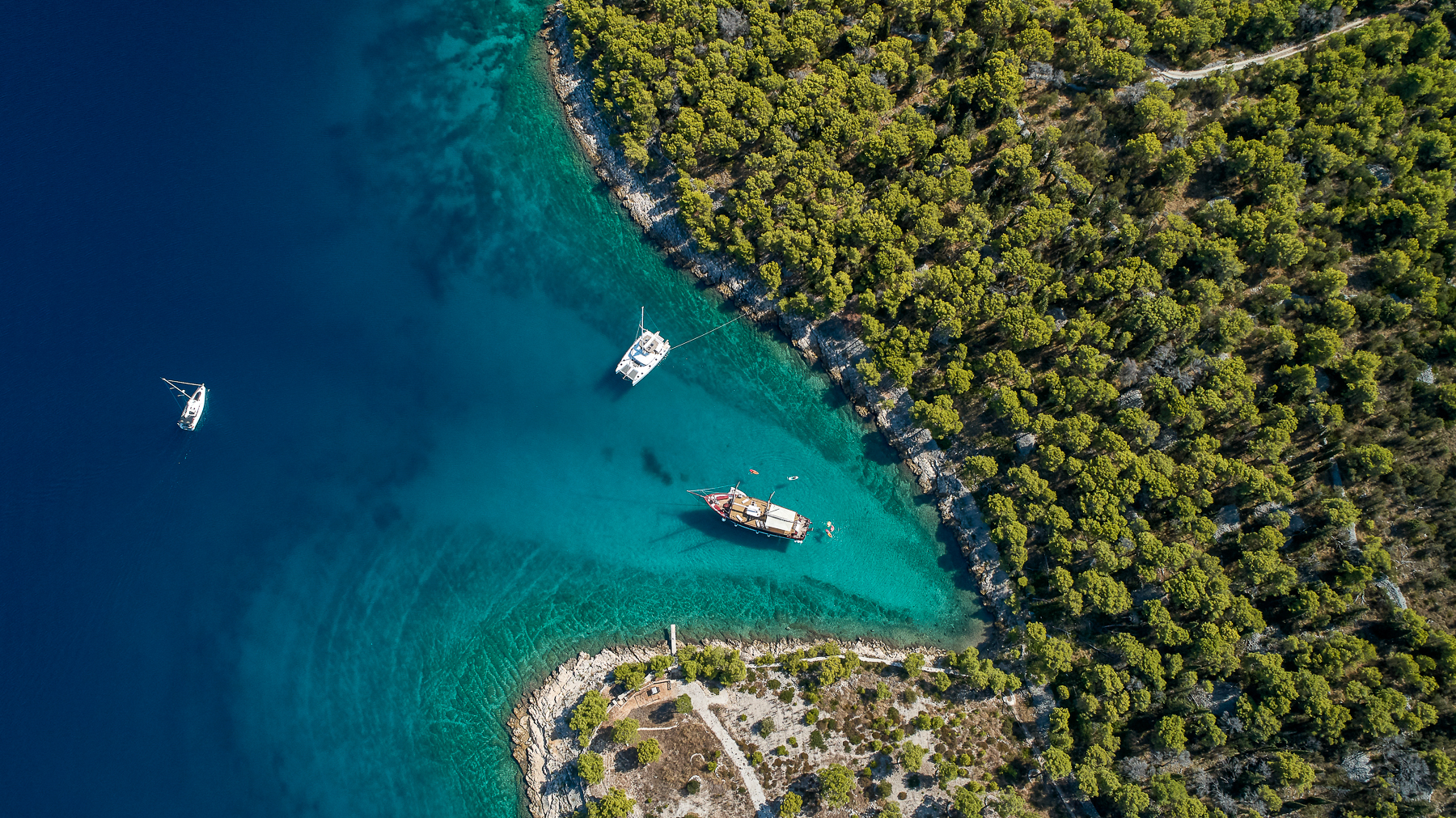 Aerial view of the Romanca luxury motor sailer moored in a bay in Croatia
