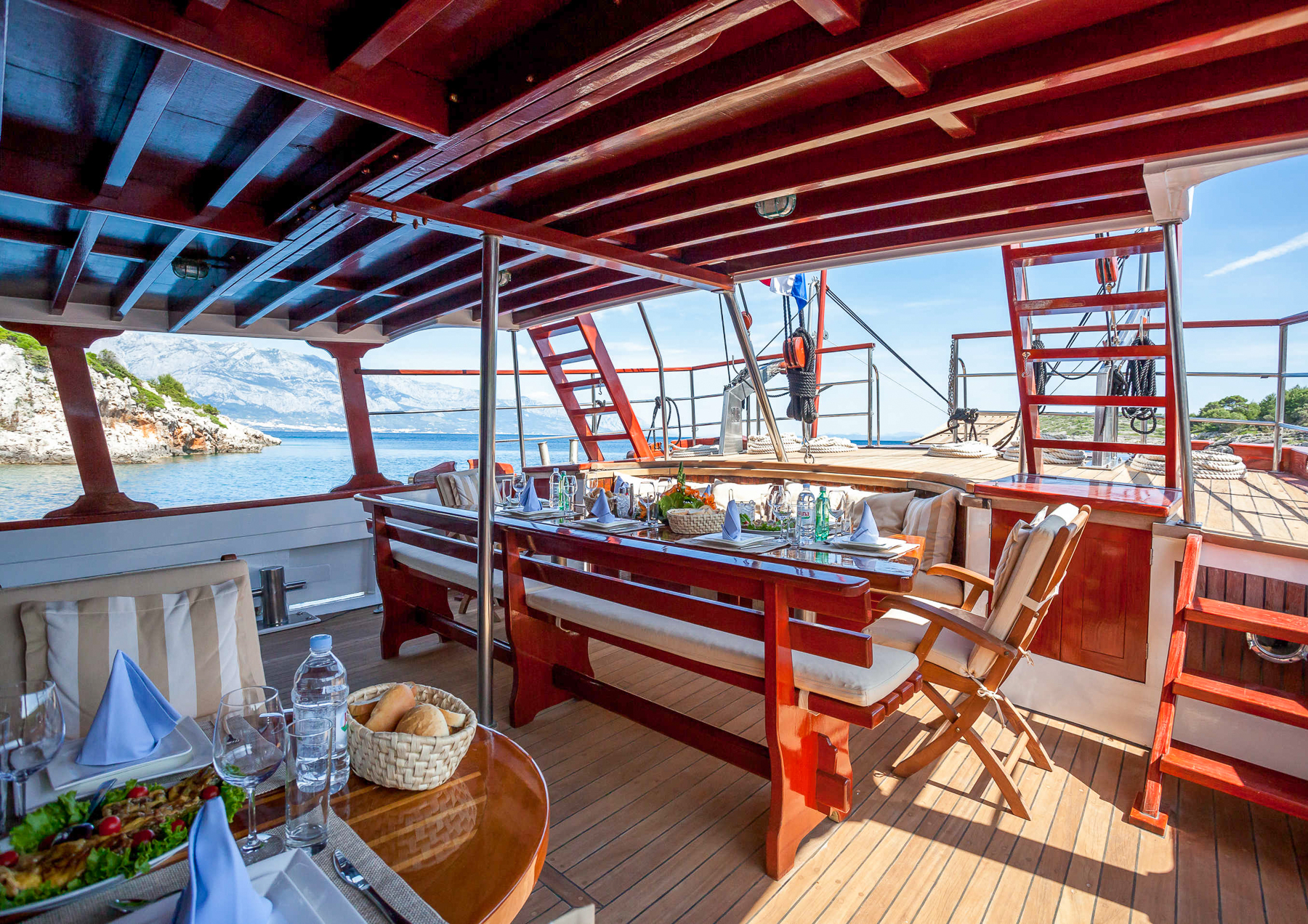 Alfresco dining table onboard the Romanca luxury motor sailer in Croatia