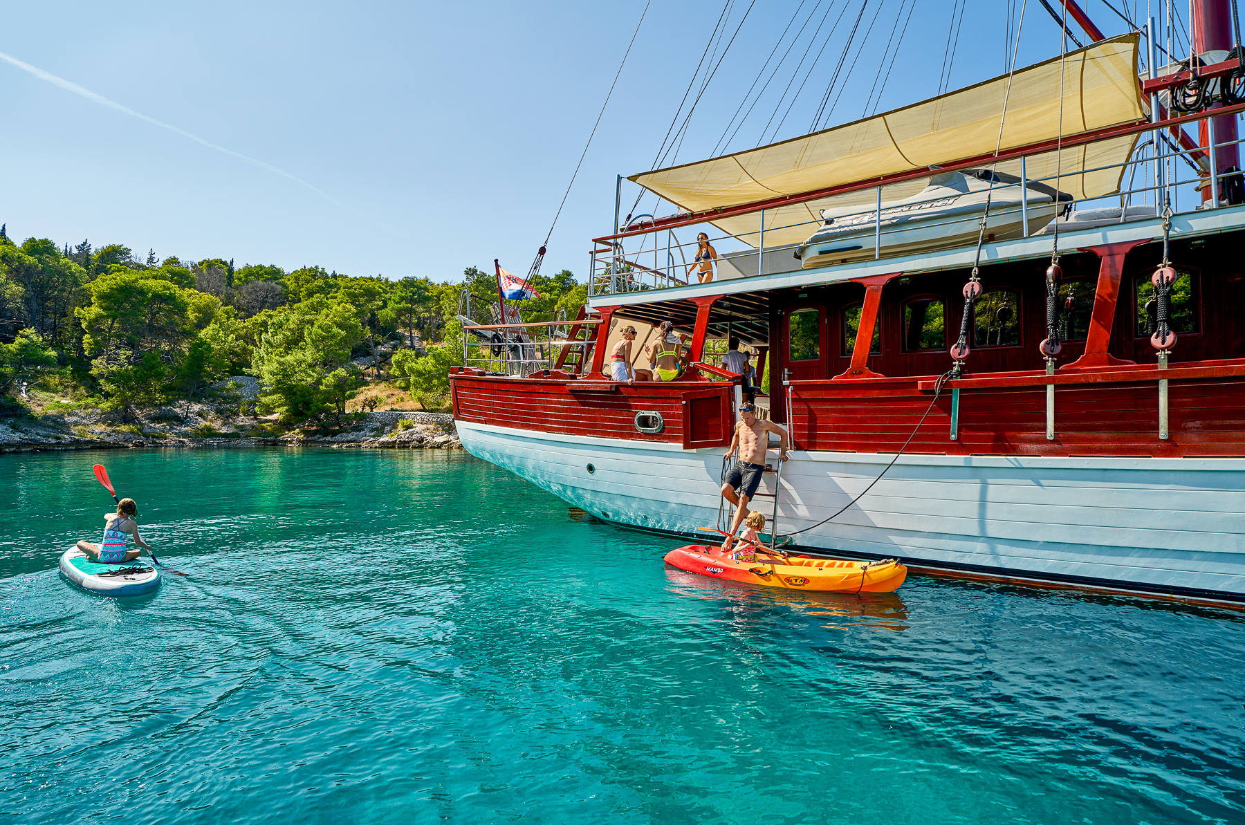 Guests of the Romanca luxury motor sailer doing water sports