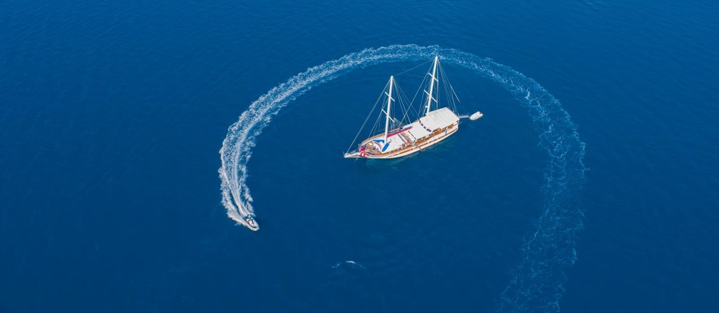 Aerial shot of luxury gulet Sadri Usta with speedboat