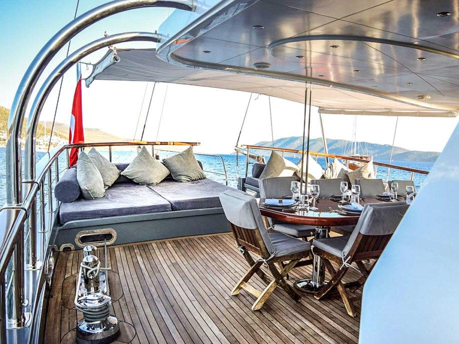 Shaded Seating and dining area on a lower deck of the luxury gulet Virtuoso