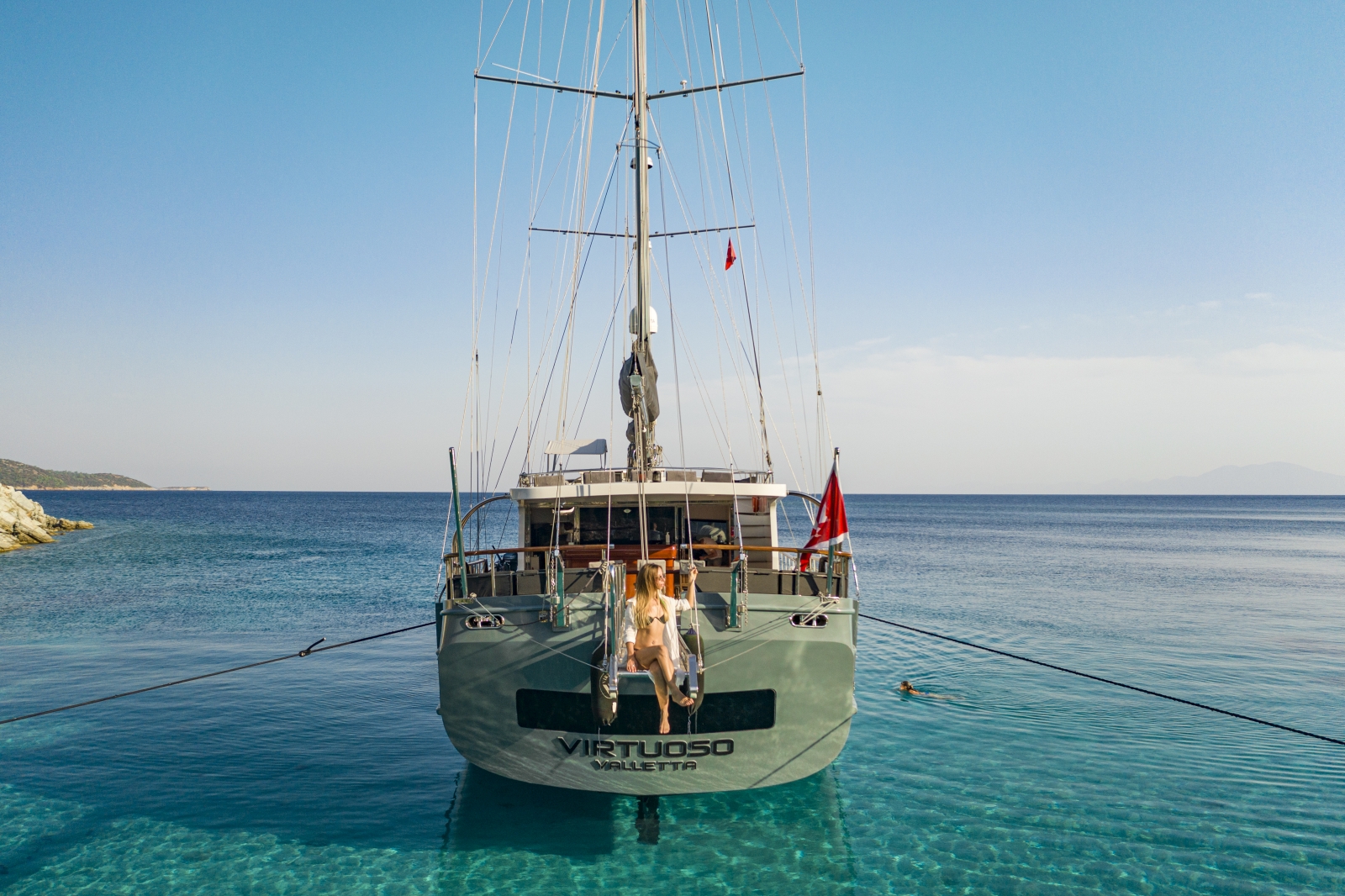 Rear view of the luxury gulet Virtuoso anchored in the turquoise waters of the Mediterranean Sea