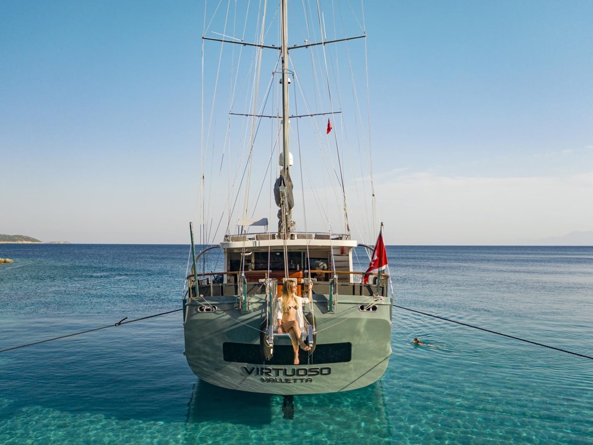 Rear view of the luxury gulet Virtuoso anchored in the turquoise waters of the Mediterranean Sea
