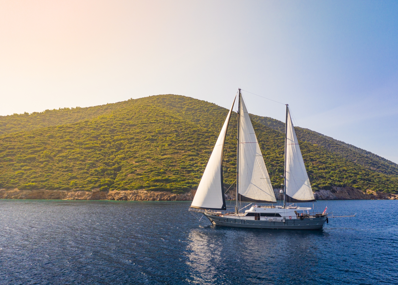 the luxury gulet Virtuoso sailing along the Greek Coast