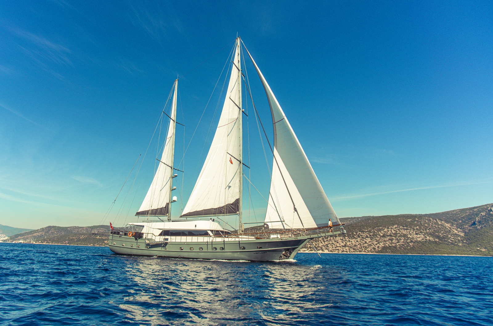 the luxury gulet Virtuoso sailing along the Greek Coast