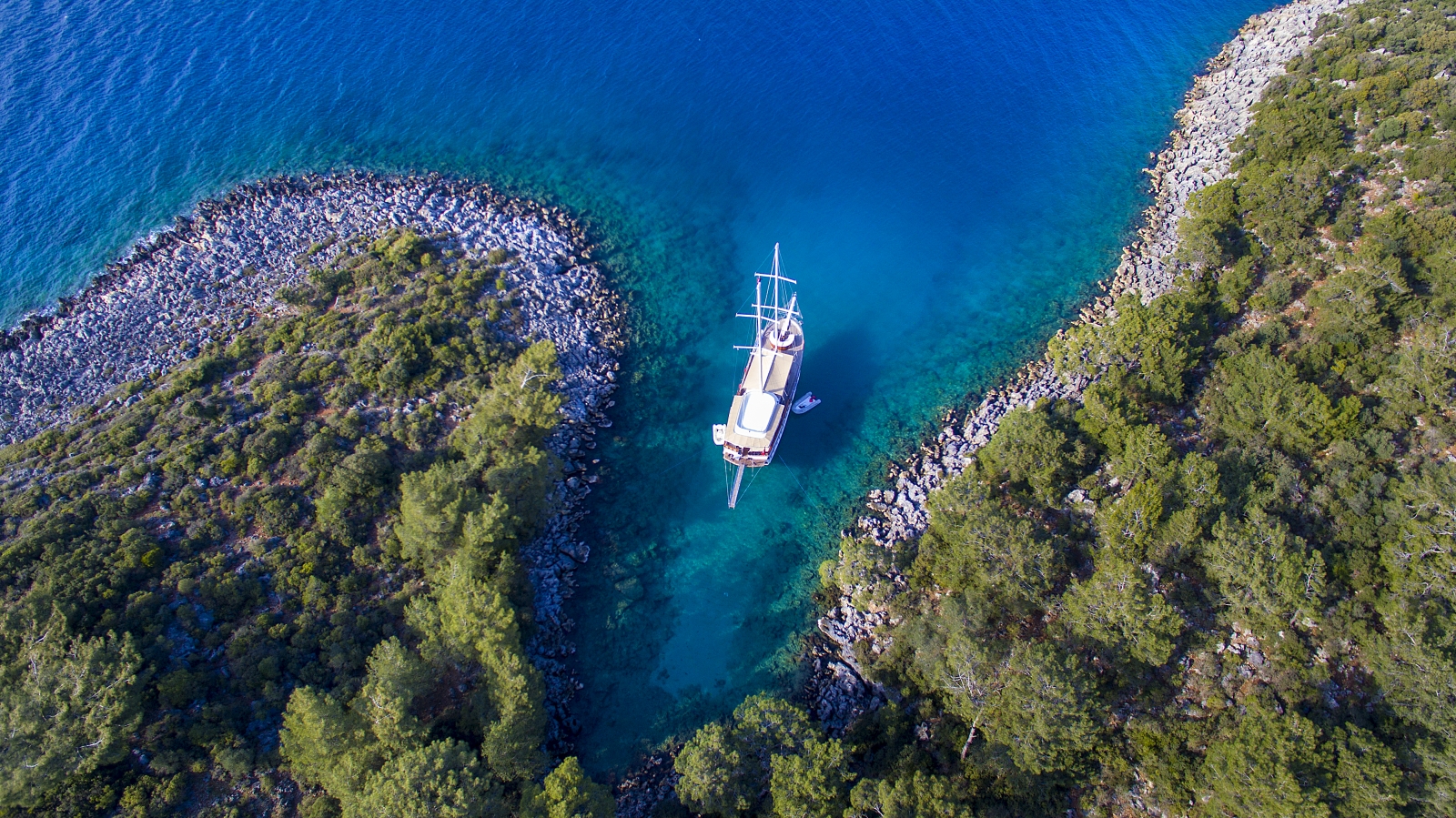 Aerial shot of luxury gulet Vivere anchored in a bay of the Croatian coast