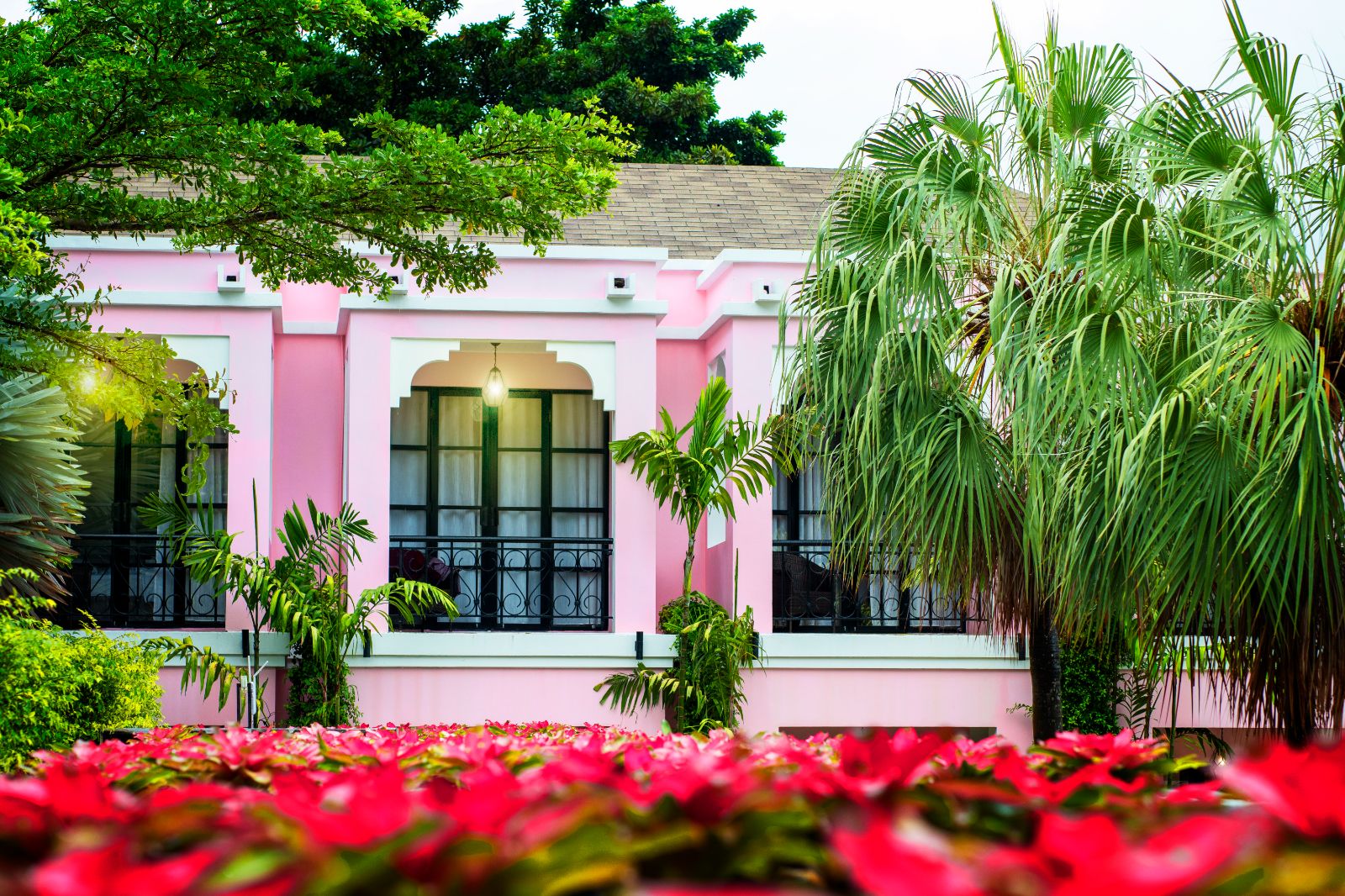 Exterior of the main pink building at luxury zen resort Absolute Sanctuary 