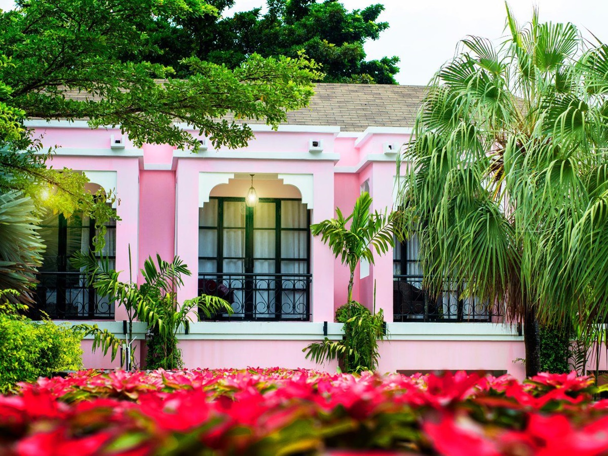 Exterior of the main pink building at luxury zen resort Absolute Sanctuary