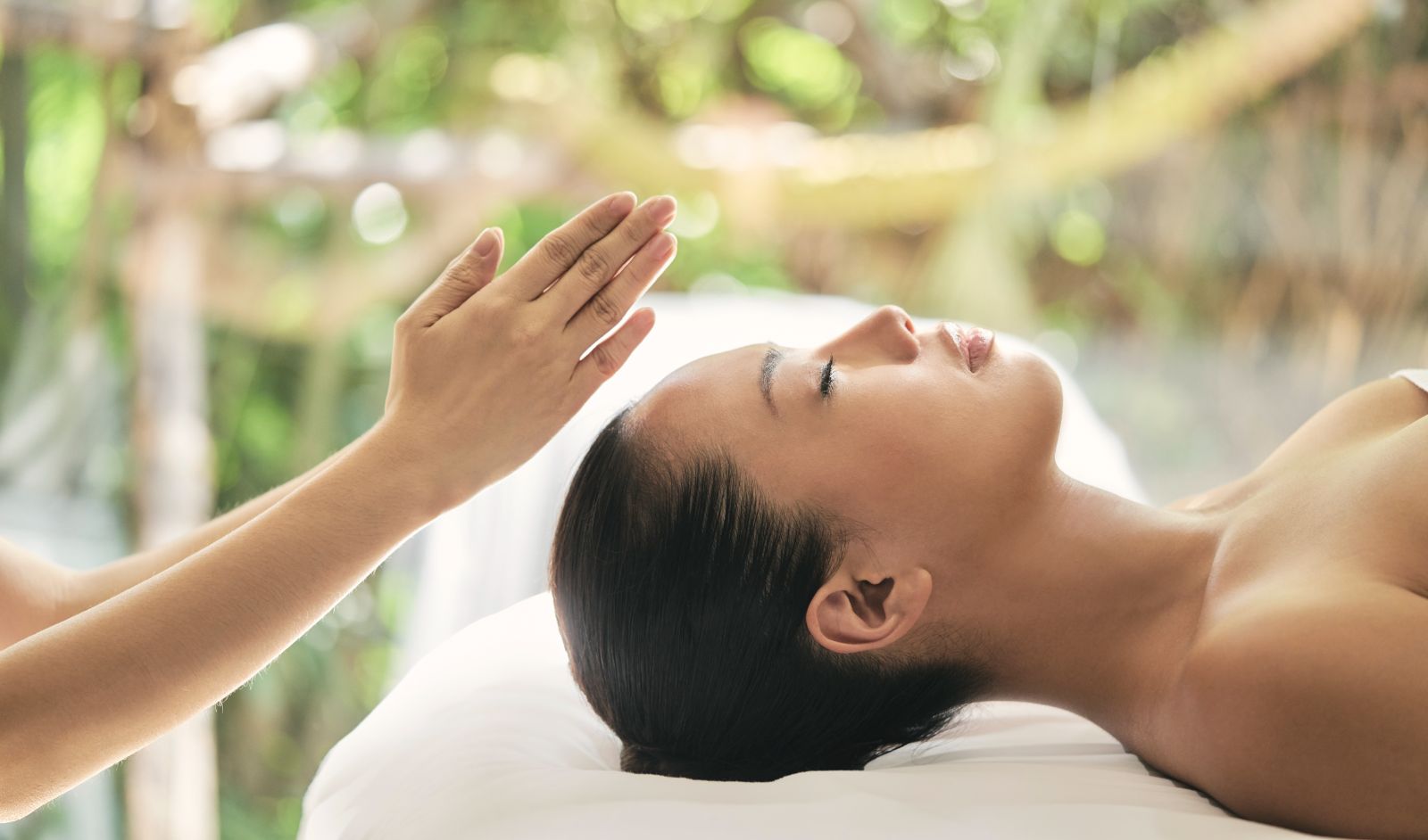 A lady receiving chakra healing at Luxury resort Chiva Som 