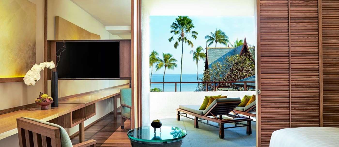 Ocean Premium room living area and balcony with sea view at Luxury resort Chiva Som